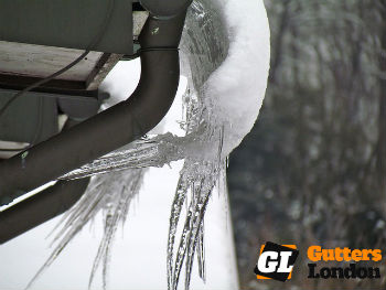 Frozen water in a gutter