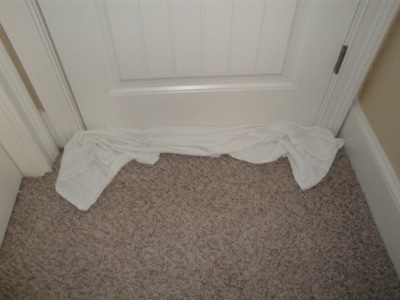 Bath towel under the door